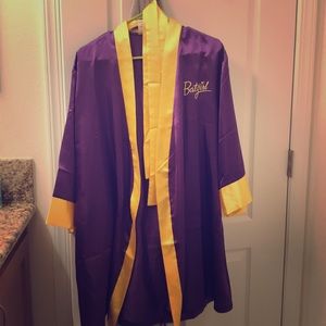 Batgirl Purple & yellow. Knee length. Smoke-free.